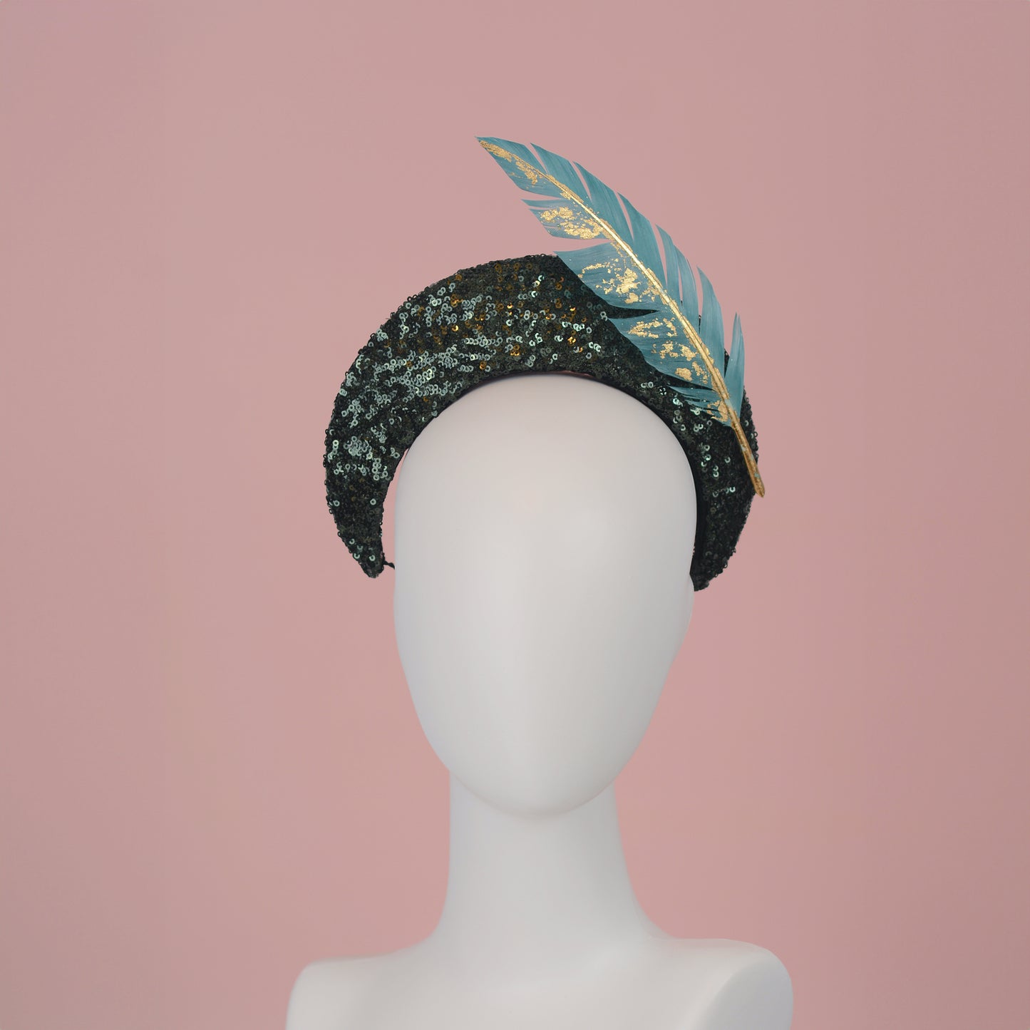 Sequin Bandeau Headband with Floating Gold Leaf Feather on a Deep Green