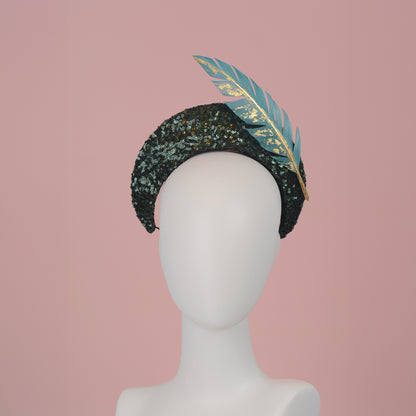 Sequin Bandeau Headband with Floating Gold Leaf Feather on a Deep Green