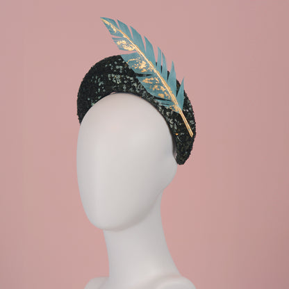 Sequin Bandeau Headband with Floating Gold Leaf Feather on a Deep Green