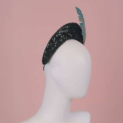 Sequin Bandeau Headband with Floating Gold Leaf Feather on a Deep Green