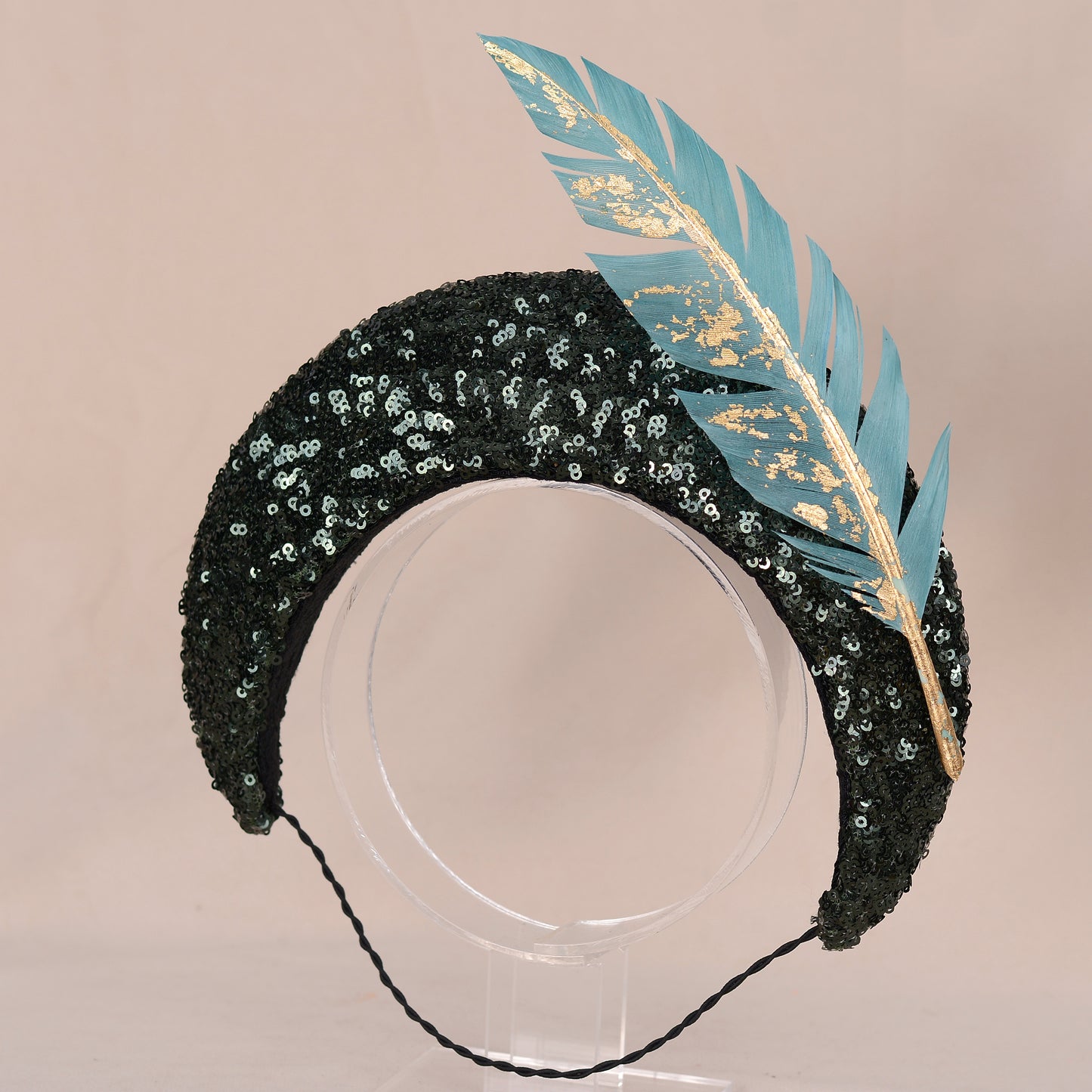 Sequin Bandeau Headband with Floating Gold Leaf Feather on a Deep Green