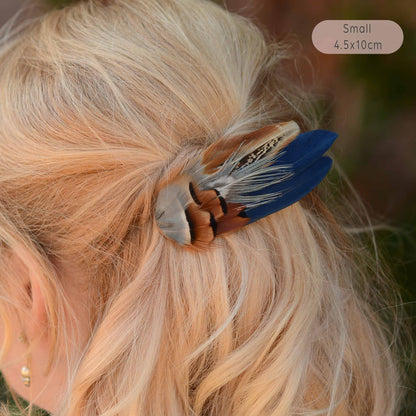 Pheasant and partridge feather hair clip in navy blue, copper and grey blue. A decorative hair accessory ideal for bridesmaids and brides