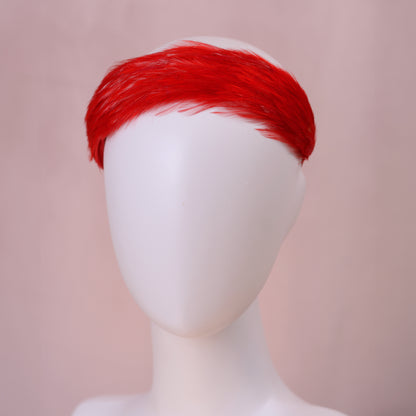 A bright tomato red feather hair accessory headband displayed on a white mannequin head against a soft pink background.