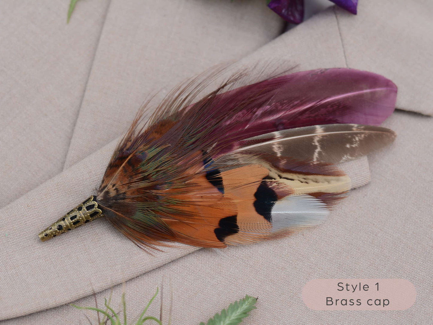 Large feather boutonniere brooch in purple, burgundy and copper pheasant feathers with brass cap.