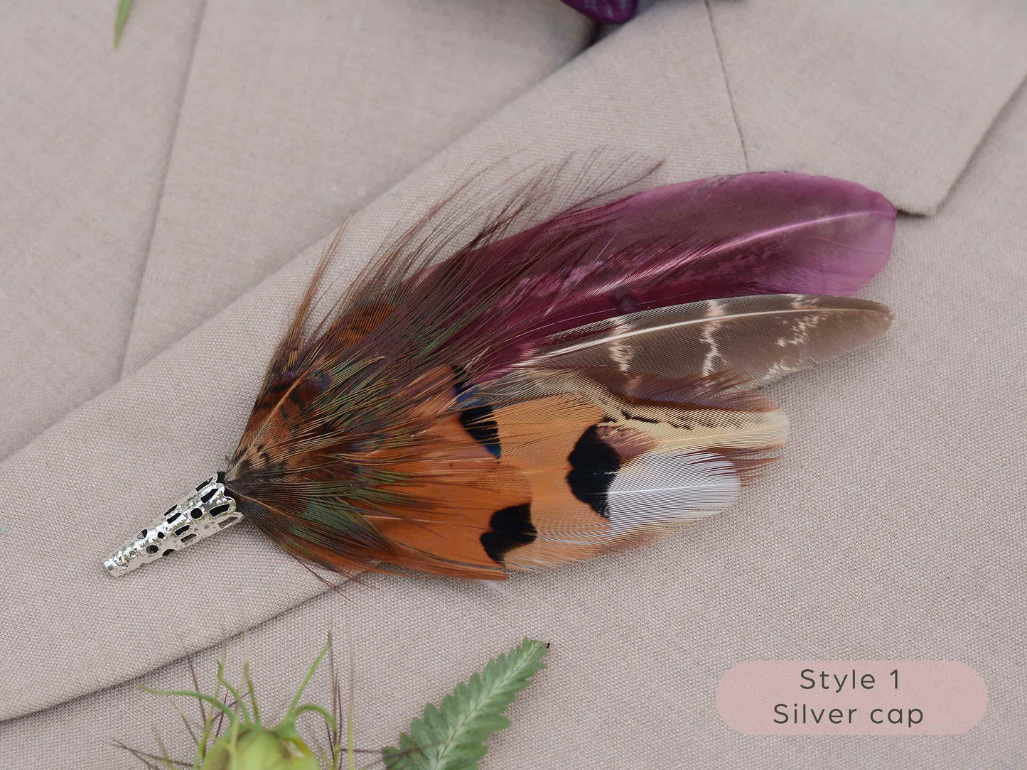 Large feather boutonniere brooch in purple, burgundy and copper pheasant feathers with silver metal cap.