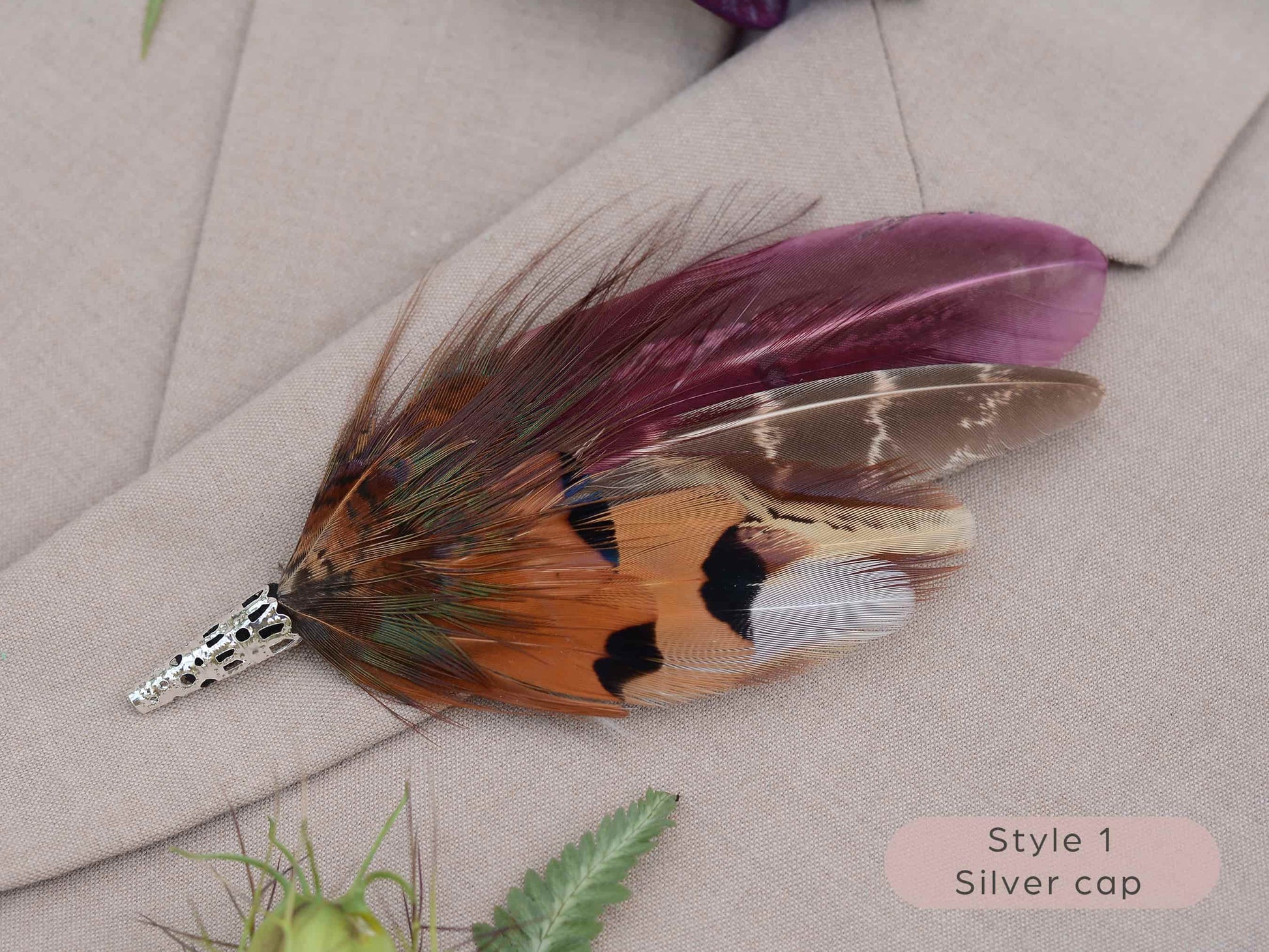 Large feather boutonniere brooch in purple, burgundy and copper pheasant feathers with silver metal cap.