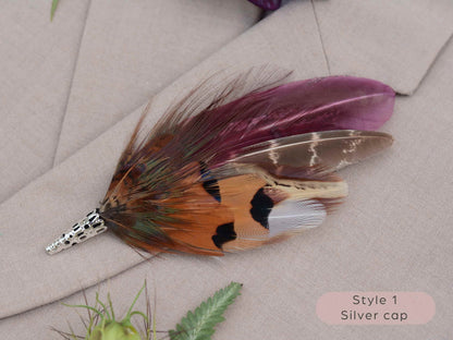 Large feather boutonniere brooch in purple, burgundy and copper pheasant feathers with silver metal cap.