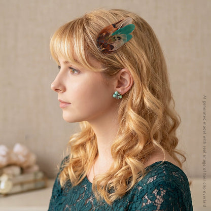 A woman in profile wearing a feather hair clip and matching turquoise stud earrings, with wavy blonde hair and a lace top, against a soft beige background.
