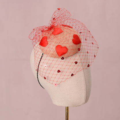 The Love Heart Button Hat with Sequin Veil in Blush Pink and Red